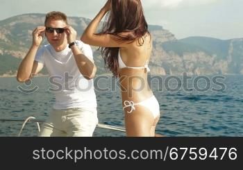 Adult couple enjoying the cruise on a speedboat