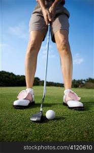 Adult Female Golfing