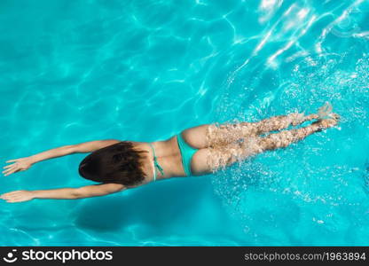 adult female swimming bright clear water. High resolution photo. adult female swimming bright clear water. High quality photo