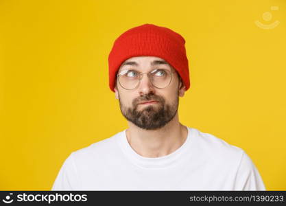 Adult hispanic man over isolated background depressed and worry for distress, angry and afraid. Sad expression.. Adult hispanic man over isolated background depressed and worry for distress, angry and afraid. Sad expression