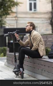 adult male enjoying coffee outdoors