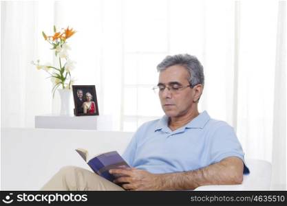 Adult man reading a book