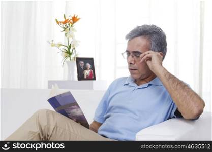 Adult man reading a book