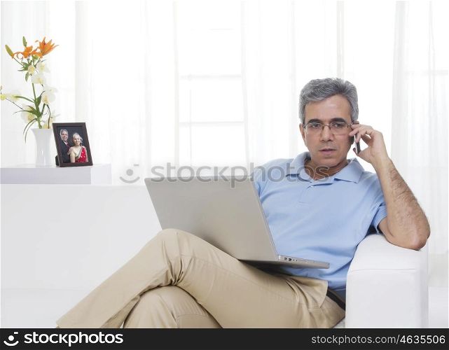 Adult man working on a laptop