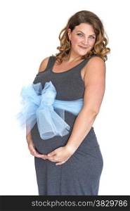 adult pregnant woman holding her hands on her belly and blue bow
