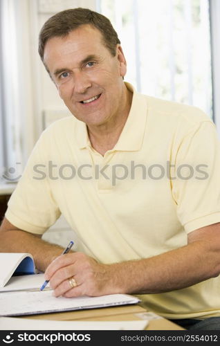 Adult student studying at table