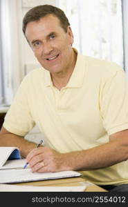 Adult student studying at table