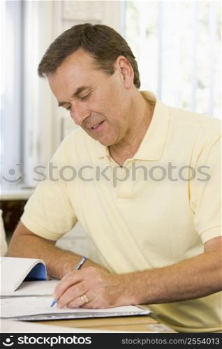Adult student studying at table