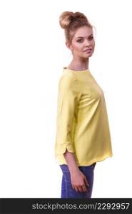 Adult woman presenting her casual beautiful outfit, long sleeved yellow top and jeans.. Woman wearing casual outfit