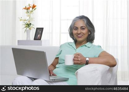 Adult woman working on a laptop