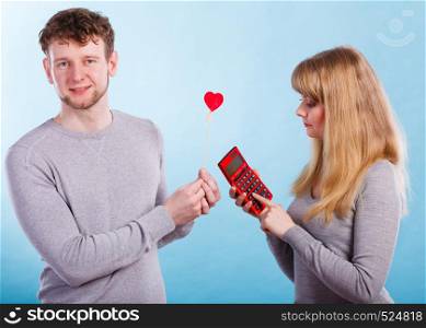 Advantages and disadvantages of relationship. Young blonde attractive lady calculate percentage provision of being girlfriend. . Woman making calculation of relationship.