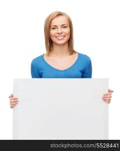 advertisement and people concept - smiling girl with blank white board