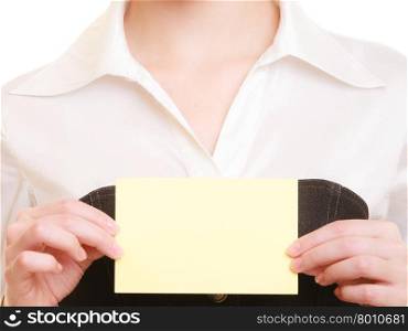 Advertisement. Blank copy space yellow business card in hands of woman. Businesswoman recommending your product