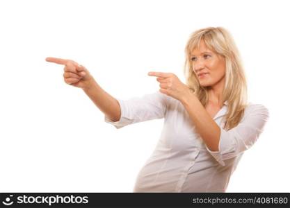 Advertisement concept - mature business woman pointing with finger showing blank copy space isolated on white background