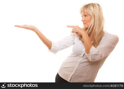 Advertisement concept - mature business woman pointing with finger showing open hand palm with blank copy space for product or text, isolated