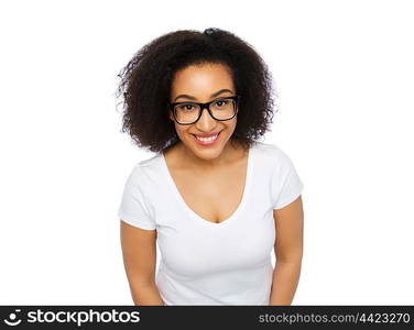 advertisement, education, ethnicity, vision and people concept - happy smiling young african woman or teenage student girl in eyeglasses and white t-shirt