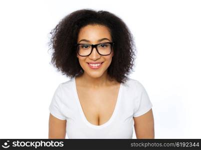 advertisement, education, ethnicity, vision and people concept - happy smiling young african woman or teenage student girl in eyeglasses and white t-shirt