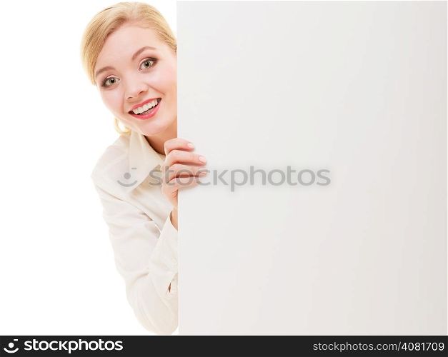 Advertisement. Happy woman hiding behind blank copy space banner isolated on white. Businesswoman recommending your product