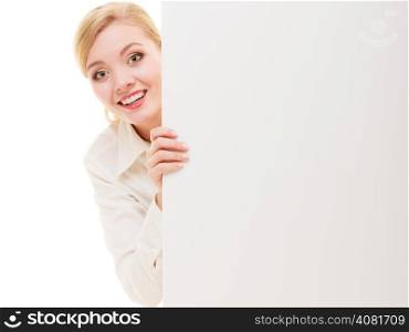 Advertisement. Happy woman hiding behind blank copy space banner isolated on white. Businesswoman recommending your product