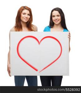 advertisement, love and people concept - smiling young girls with blank white board