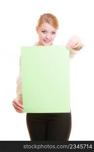 Advertisement. Young woman holding blank copy space green banner isolated on white. Businesswoman recommending your product