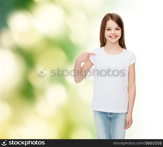 advertising, childhood, gesture, ecology and people - smiling little girl in white t-shirt pointing finger on herself over green background