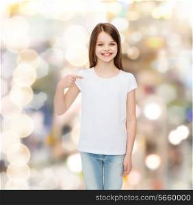 advertising, childhood, gesture, holidays and people - smiling girl in white t-shirt pointing finger on herself over sparkling background