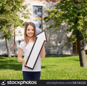 advertising, direction, summer vacation and childhood concept - smiling little girl with white blank arrow pointing up over campus background