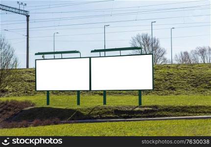 advertising, mass media and marketing concept - empty billboards in tallinn city, estonia. empty billboards in tallinn city, estonia