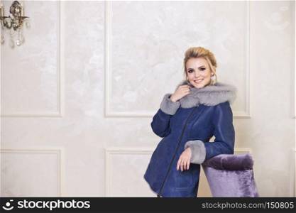 Advertising photography for store clothing.. Beautiful model posing in various outfits winter clothes 7463.