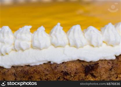 Advocaat cake on white wood macro. Advocaat cake on white wood macro.