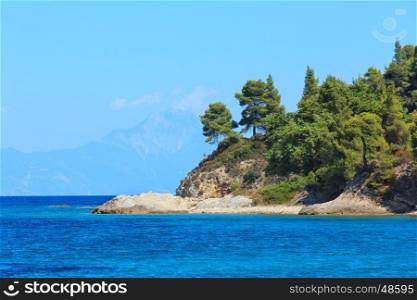 Aegean sea coast landscape and Mount Athos in mist (Sithonia, Chalkidiki, Greece).