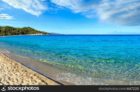 Aegean sea coast landscape with aquamarine water, view from Armenistis beach, Chalkidiki, Greece