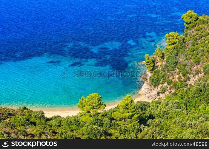 Aegean sea coast landscape with sandy beach (Chalkidiki, Greece).