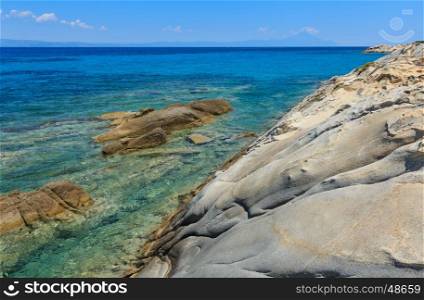 Aegean sea rocky coast landscape, view near Karidi beach (Chalkidiki, Greece).