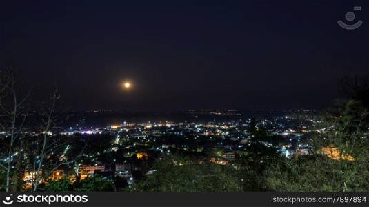 Aerial city view of Uthai Thani at night, Thailand