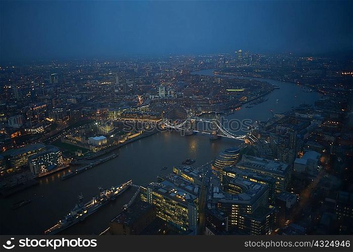 Aerial cityscape of river Thames and Tower bridge at night, London, England, UK