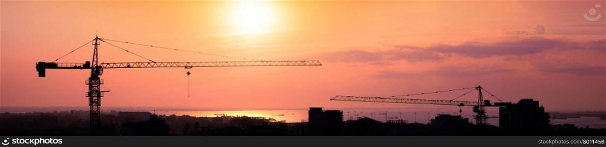 Aerial cityscape panorama view of building construction near the harbor at sunrise. Yangon, Myanmar (Burma) travel landscapes and destinations