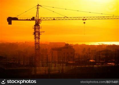 Aerial cityscape panorama view of building construction near the harbor at sunrise. Yangon, Myanmar (Burma) travel landscapes and destinations