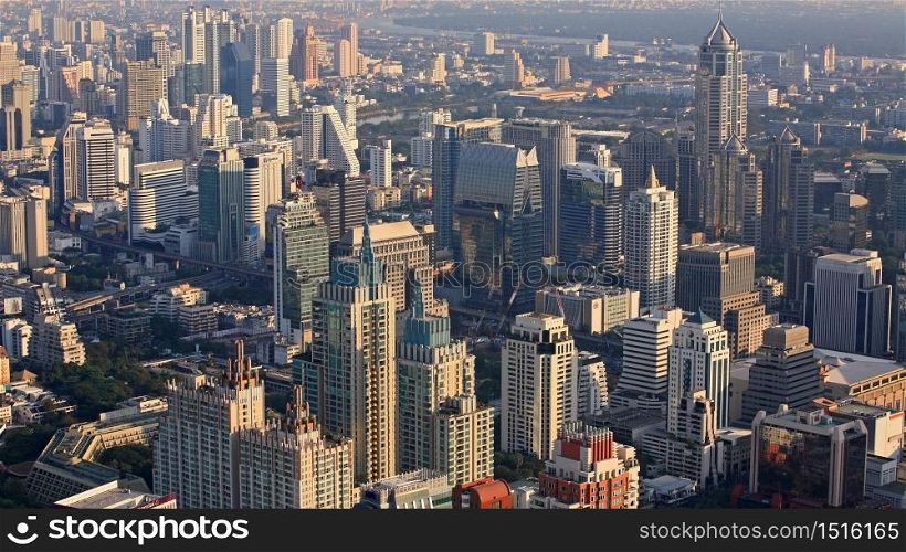 aerial cityscape view of modern buildings at ratchaprasong district in bangkok, thailand
