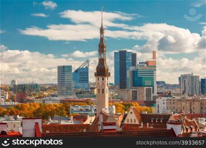 Aerial cityscape with old town hall spire and modern office buildings skyscrapers in the background in Tallinn in the day, Estonia
