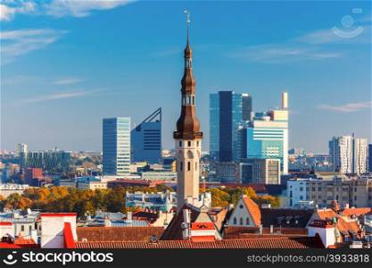 Aerial cityscape with old town hall spire and modern office buildings skyscrapers in the background in Tallinn in the day, Estonia