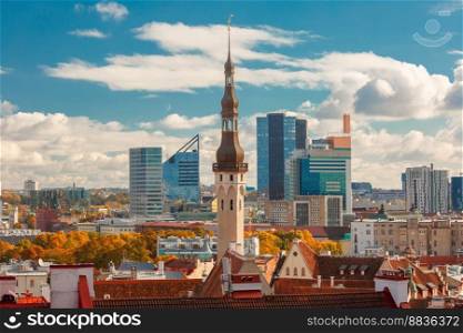 Aerial cityscape with old town hall spire and modern office buildings skyscrapers in the background in Tallinn in the day, Estonia. Aerial cityscape of Tallinn, Estonia