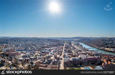 Aerial drone panoramic shot of the downtown area of Morgantown with the WVU campus in the early winter. Aerial drone view of the downtown and university in Morgantown, West Virginia