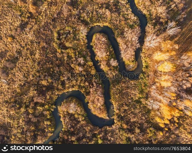 Aerial drone view of autumn landscape with river.. autumn landscape with river.