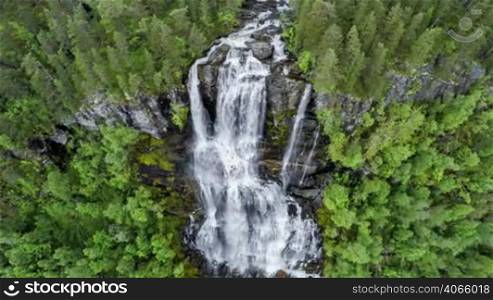 Aerial footage from Tvindefossen waterfall from the bird&acute;s-eye view, Norway