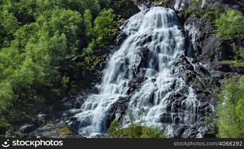 Aerial footage from Tvindefossen waterfall from the bird&acute;s-eye view, Norway