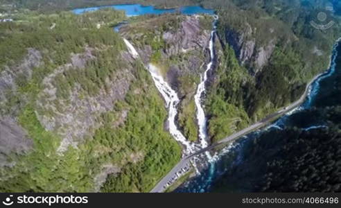 Aerial footage Latefossen Waterfall Odda Norway. Latefoss is a powerful, twin waterfall. View from the bird&acute;s-eye view.