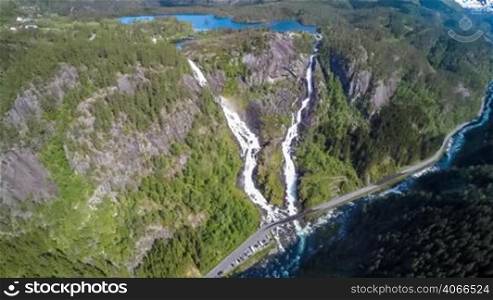 Aerial footage Latefossen Waterfall Odda Norway. Latefoss is a powerful, twin waterfall. View from the bird&acute;s-eye view.