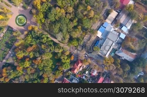 Aerial footage of autumnal nature scenery in city park. Beauty nature scene at fall season.